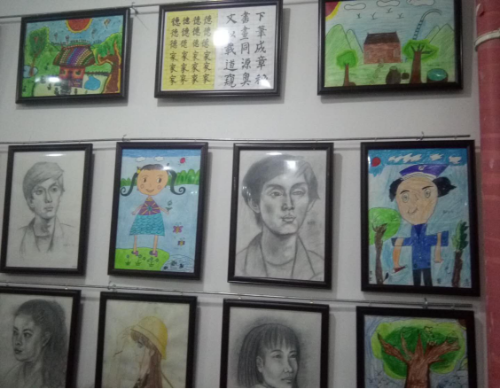 2018工作简报（八十九）禄劝文体广电旅游局文化馆、图书馆举行免费开放“青少年暑期艺术培训”书画展及结业汇报演出281